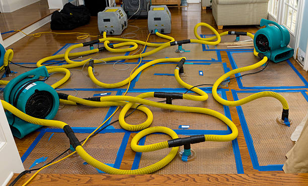 Professional Storm Water Damage Restoration technician working in Tyrone, GA